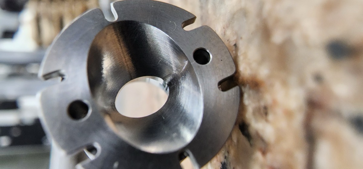 CNC Turned Steel Flange with Milled Slots